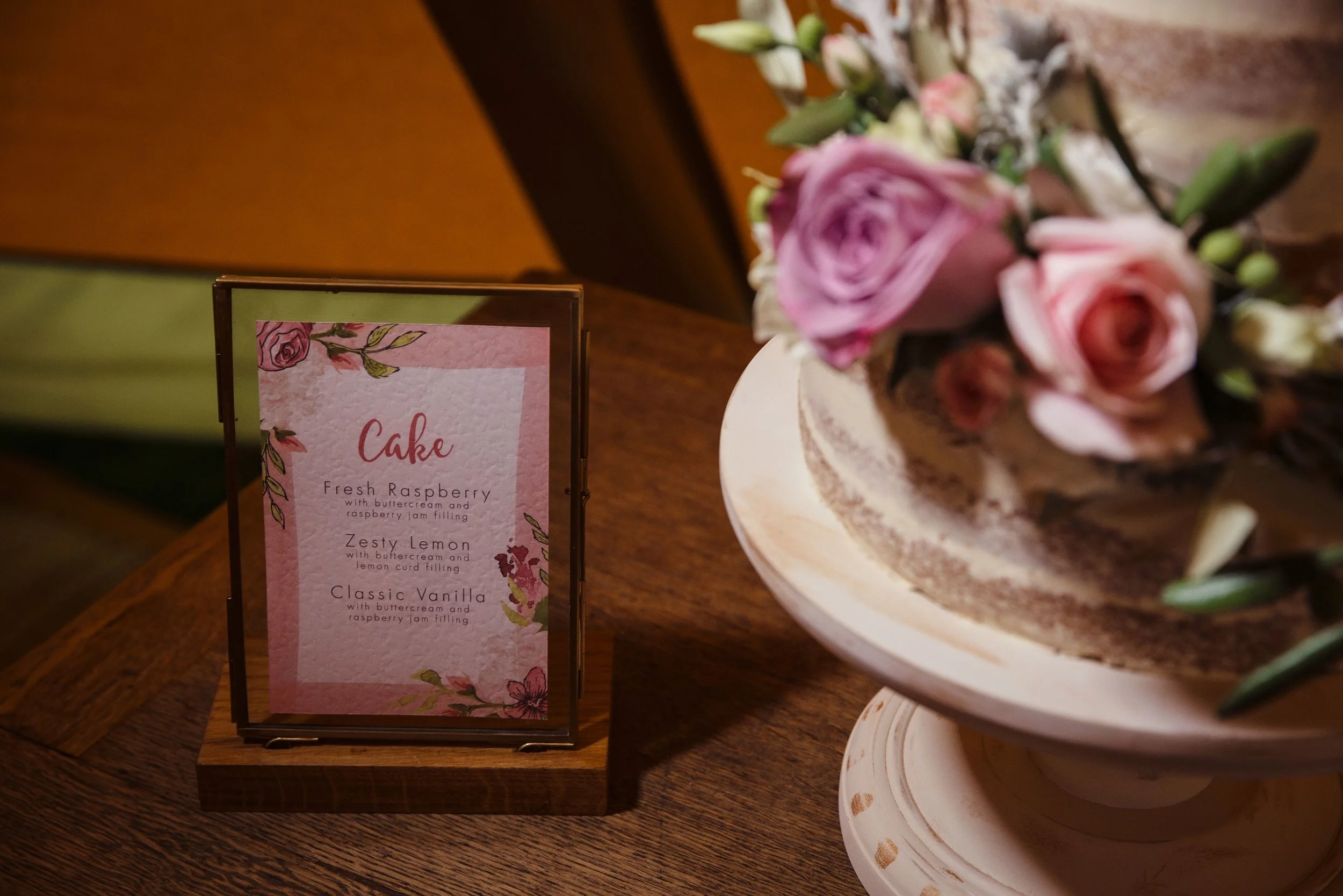 Naked cake with roses and hydrangeas