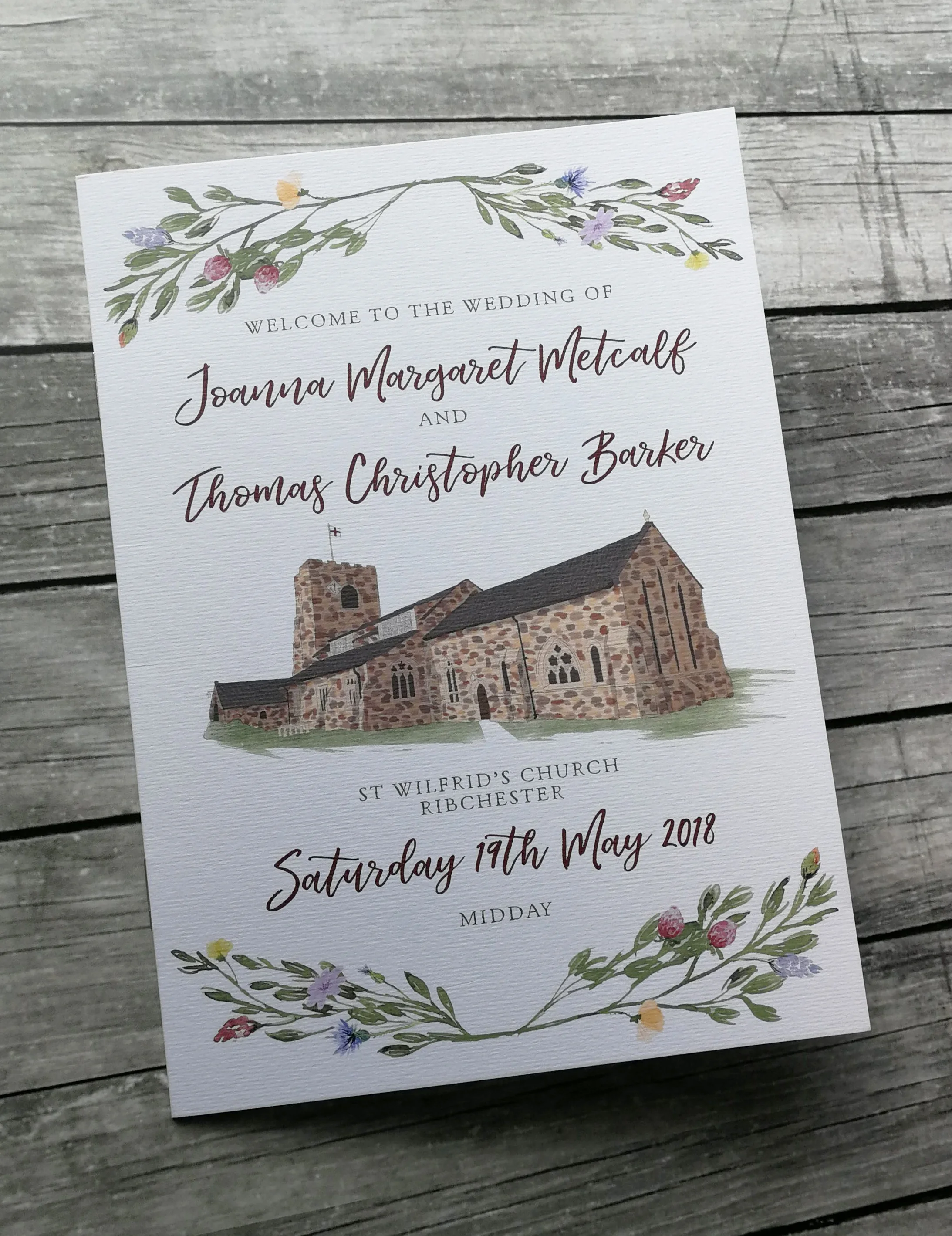 Bespoke wedding order of service with illustrated church cover