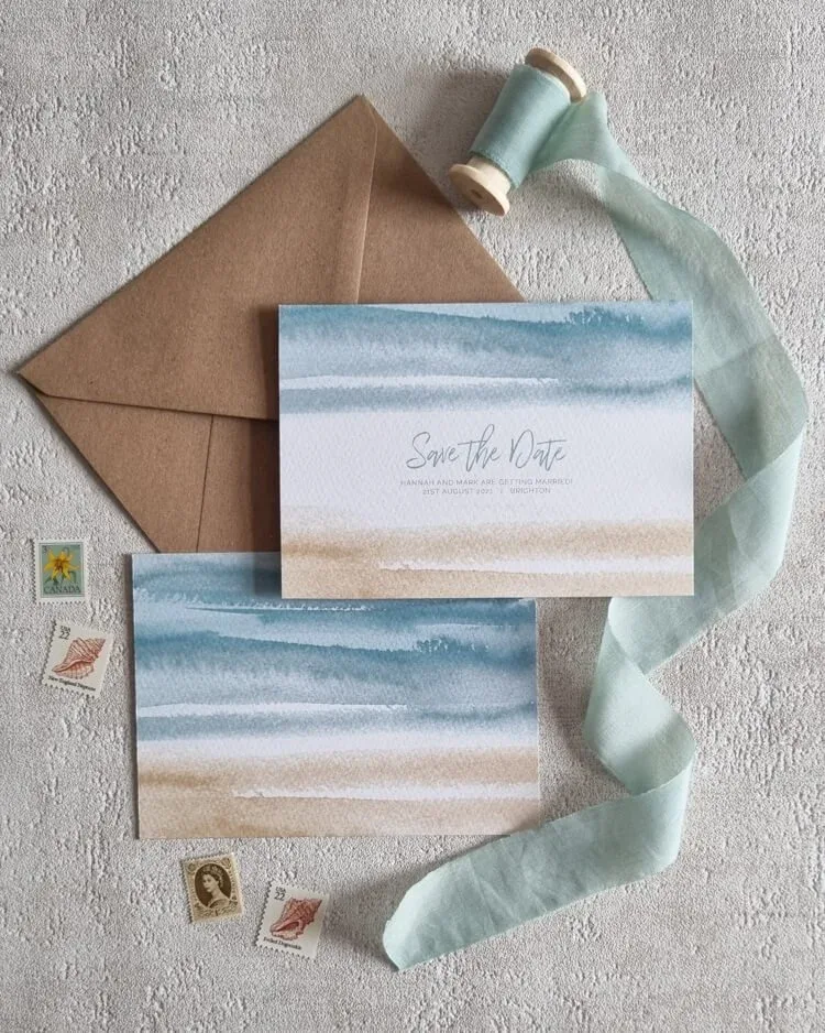 Shoreline coastal wedding stationery in blue