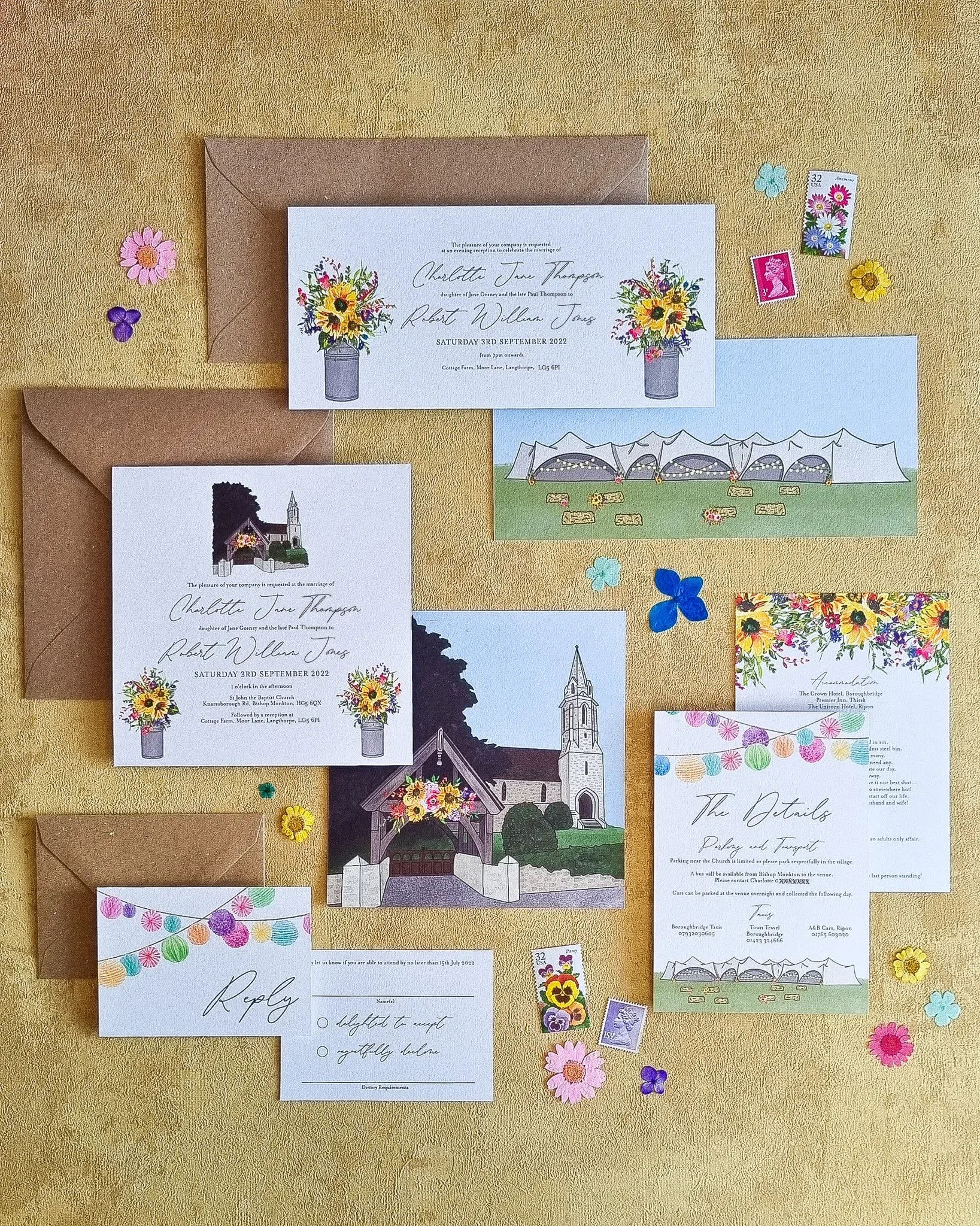 A complete wedding stationery suite laid out, showing save the dates, invitations, details cards, and RSVP cards