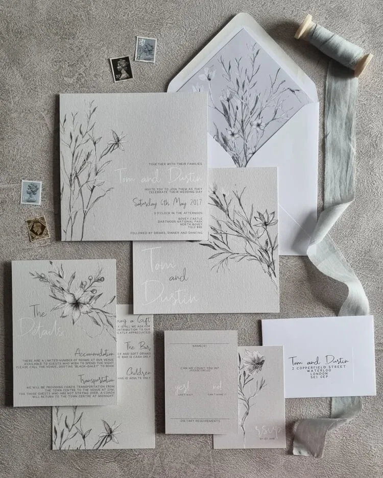 Winter wedding stationery with cool tones and sparkly details