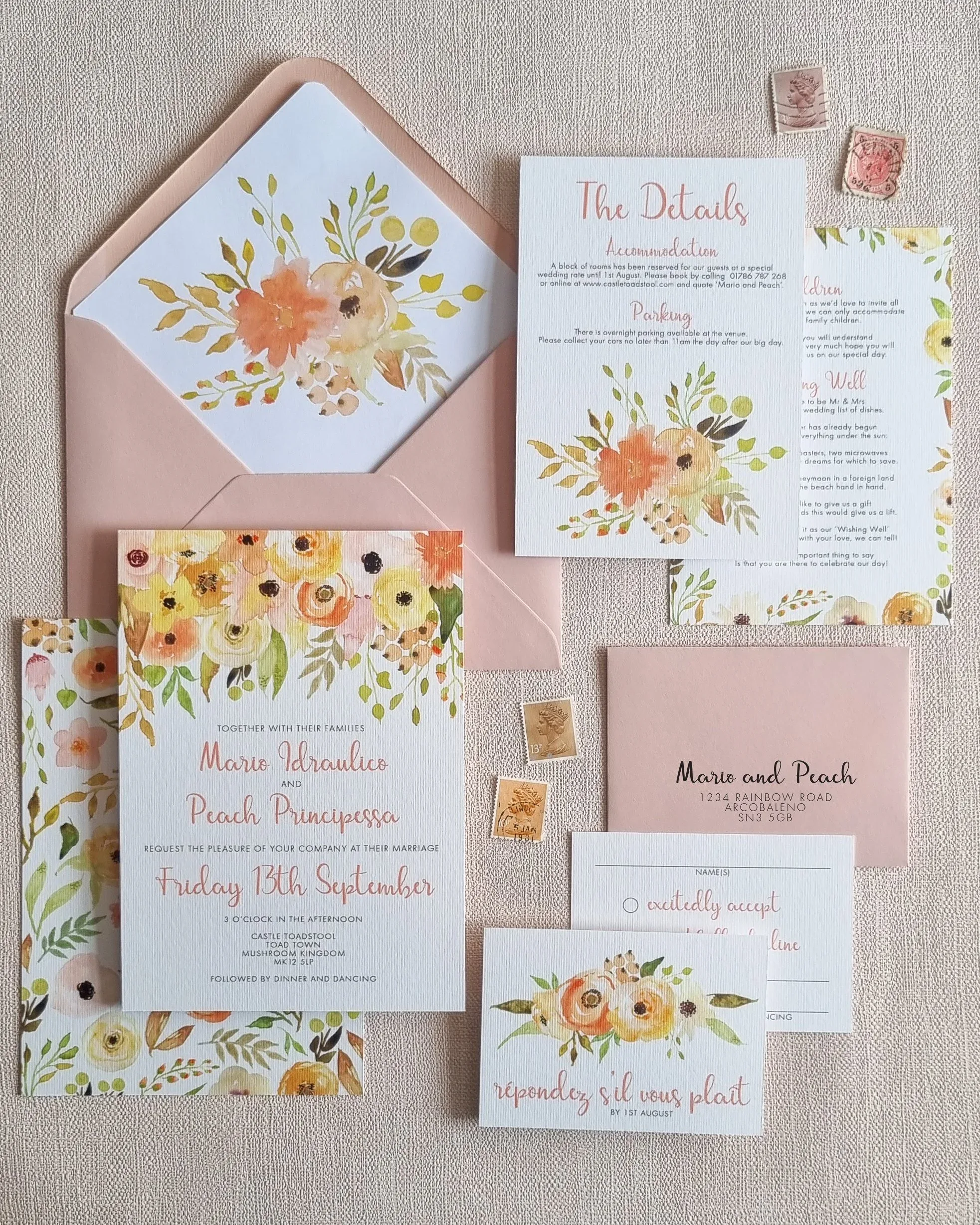 Spring wedding inspired stationery suite with pastel peach floral elements.