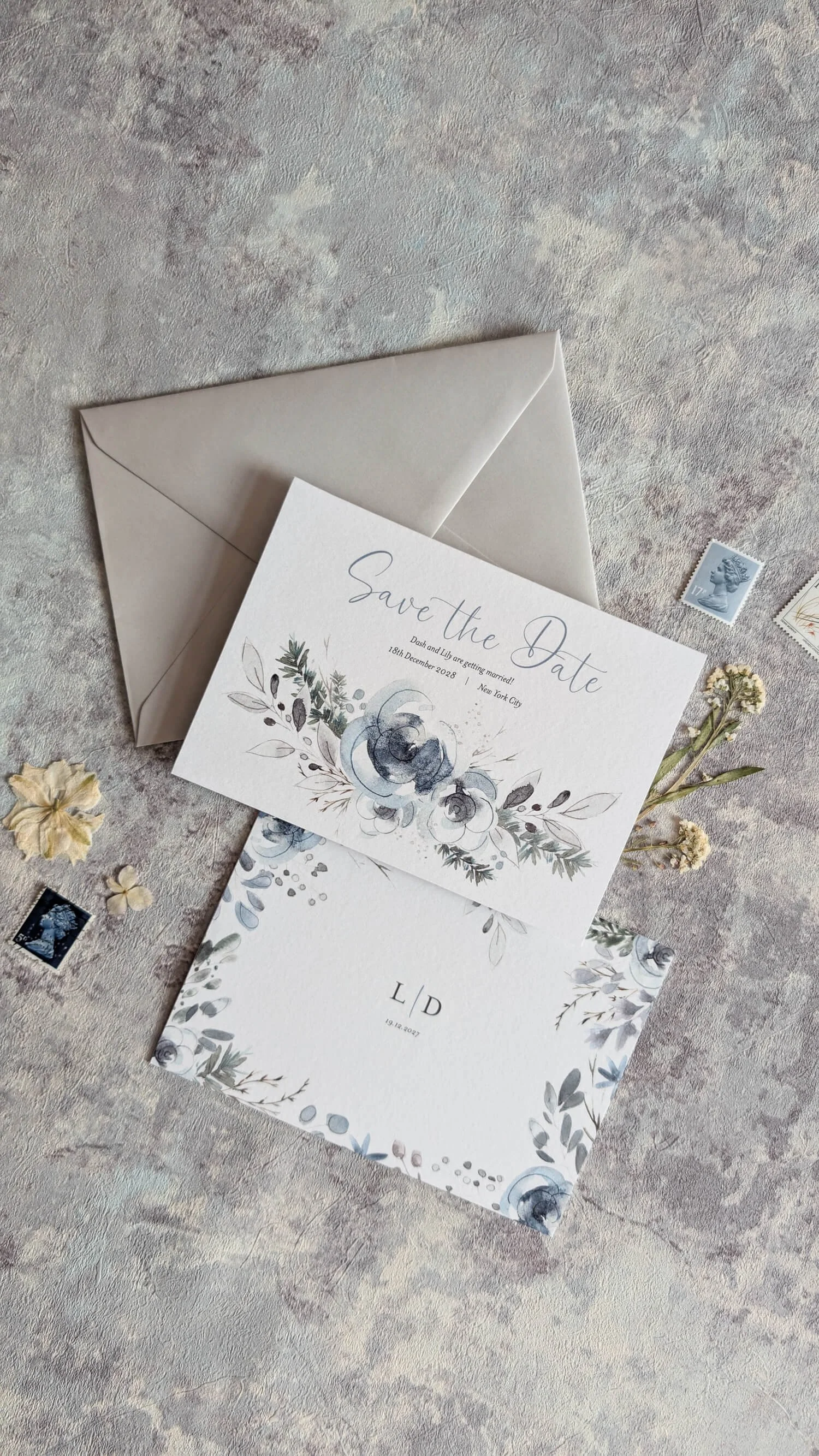 Frosted Garden wedding invitation suite flat lay