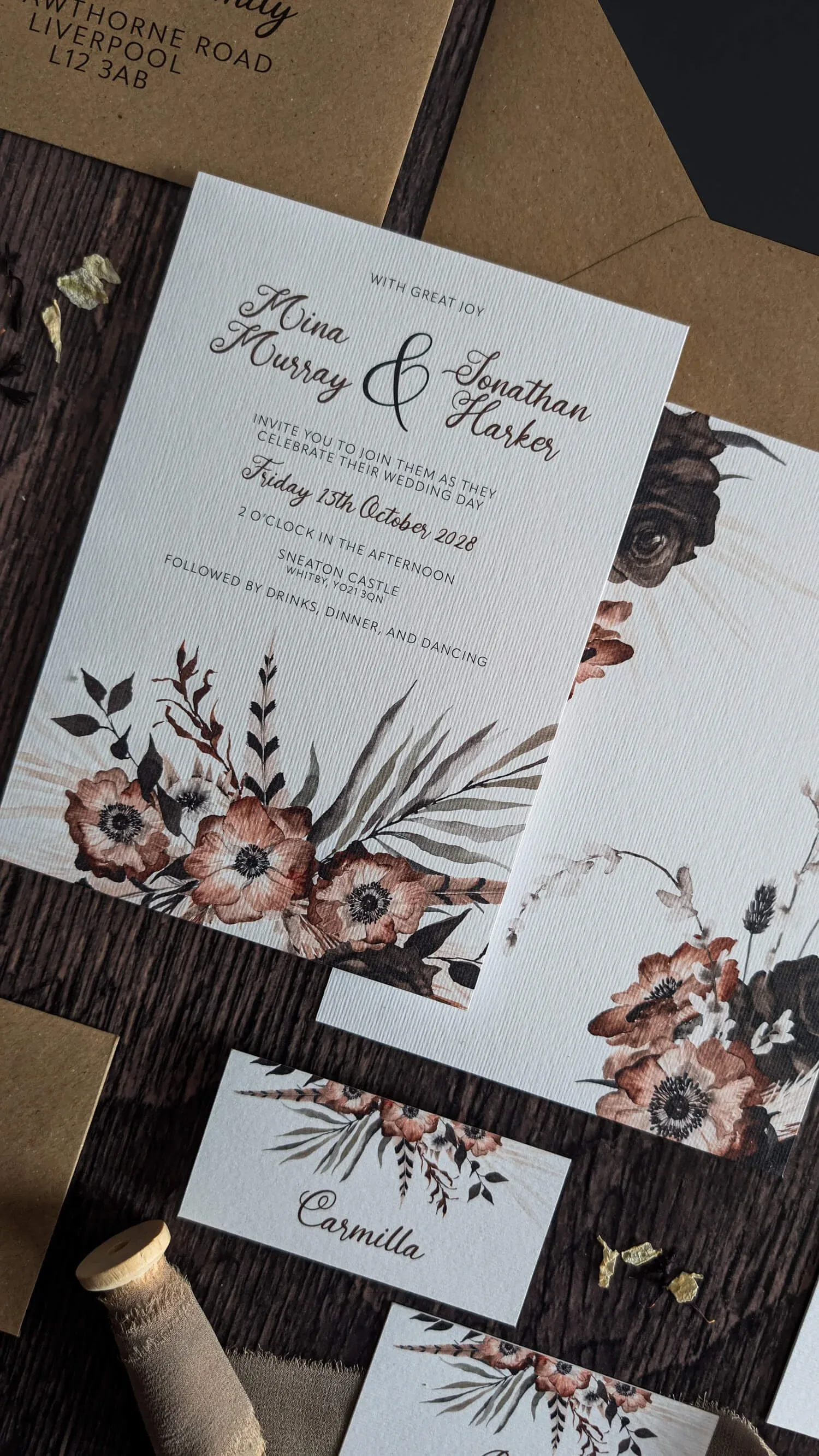 Hawthorne and Ivory Noir Boho wedding invitation with boho florals and kraft envelope suite