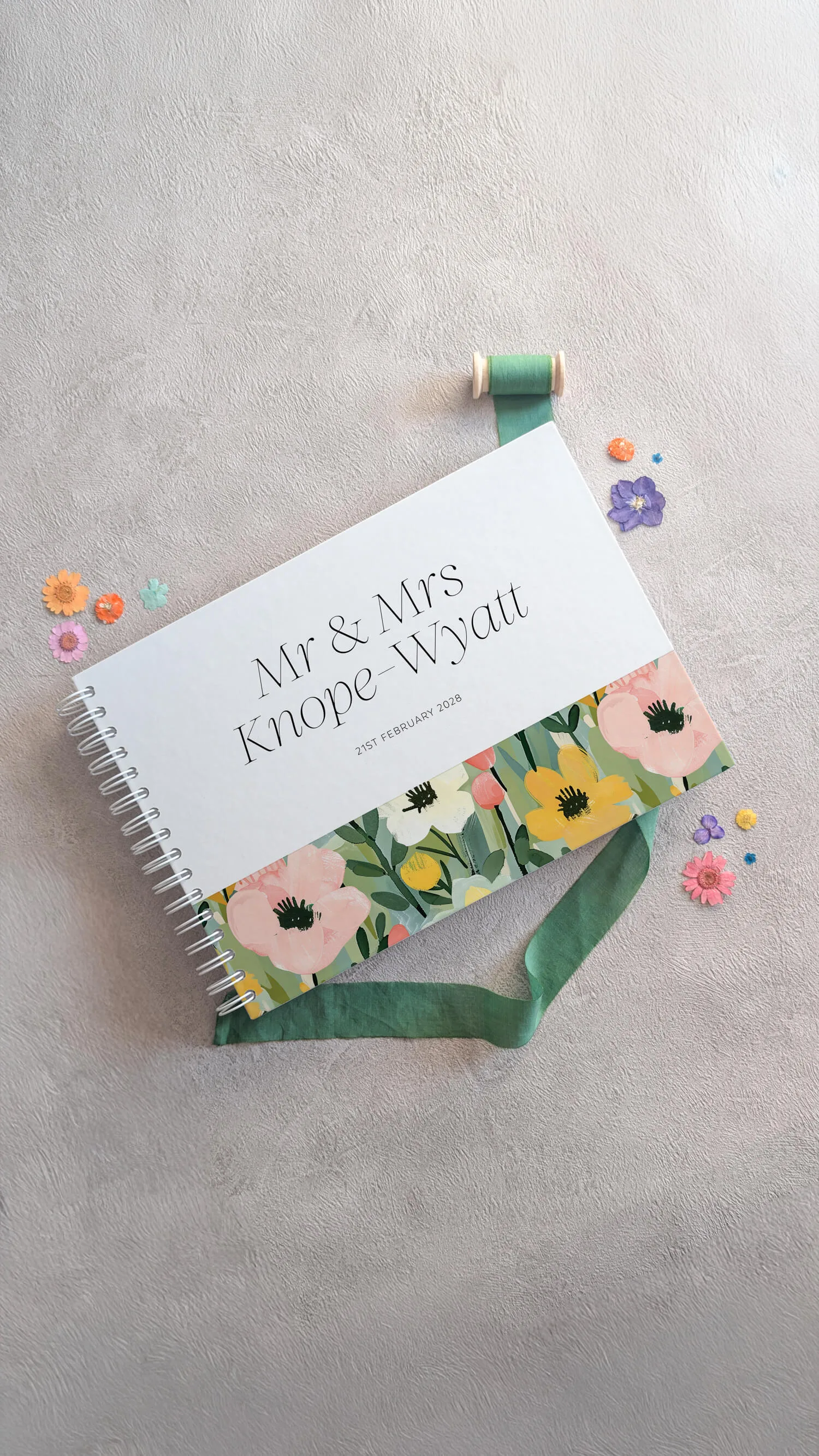 Studio Floral wedding seating chart with colourful garden flowers on easel display